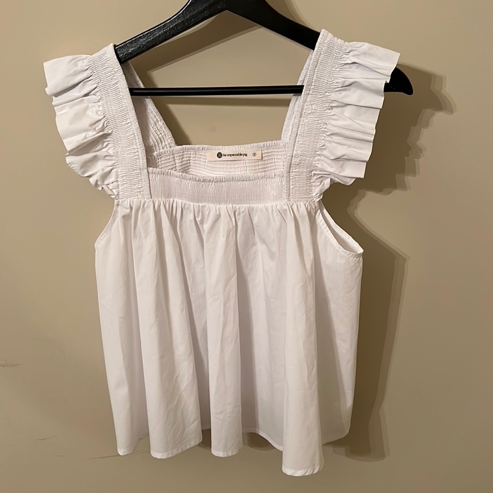 Impeccable Pig top